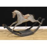 A Victorian rocking horse, sleigh base, 168cm long Provenance: reputedly removed from Friargate