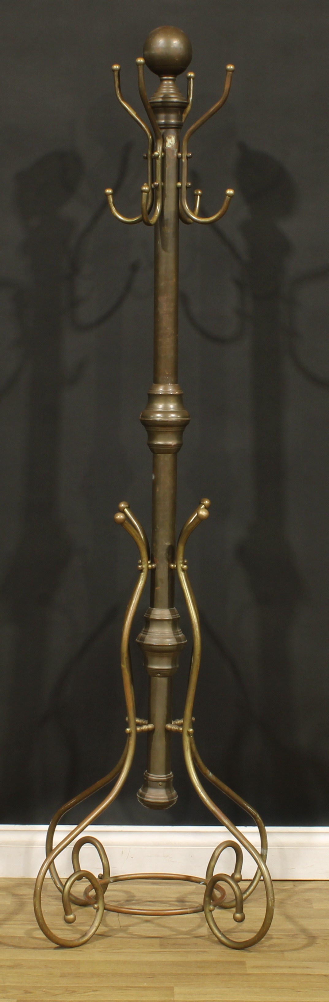 An early 20th century brass coat and hat stand, possibly American, sphere finial above four - Image 2 of 3