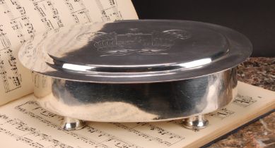 A large George VI silver oval box and cover, of 17th century design, domed cover enclosing twin-