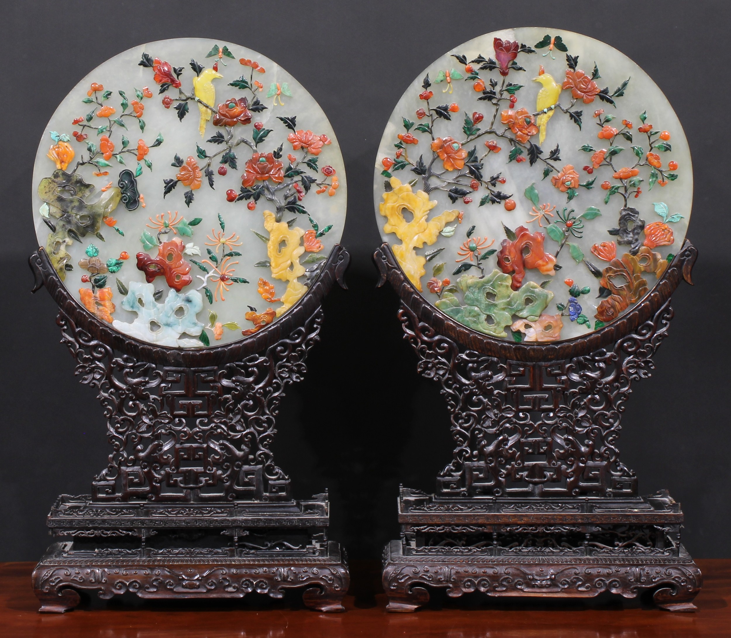 A pair of Chinese hardstone table screens, each circular tablet applied in coloured specimens with - Image 2 of 2