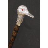 A Victorian silver mounted novelty walking stick, by Brigg, the handle as the head of a duck,