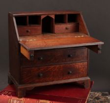 Miniature Furniture - a 19th century oak bureau, 27cm high, 27cm wide, 16cm deep