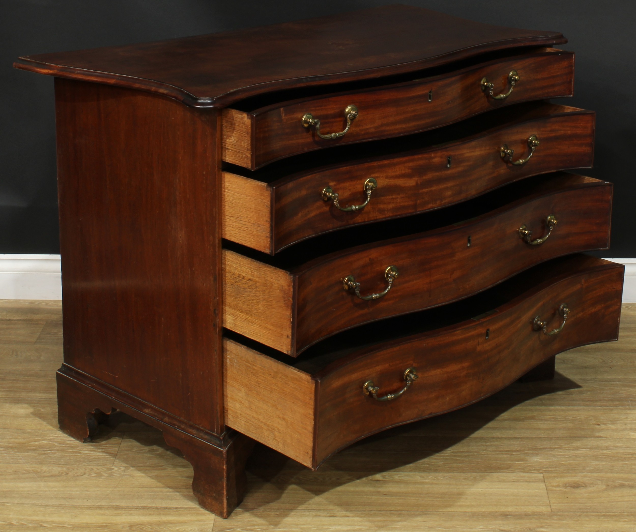 A George III mahogany serpentine chest, slightly oversailing top with moulded edge above four long - Image 3 of 5