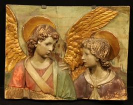 A 19th century terracotta relief panel, modelled and painted after Andrea della Robbia, with