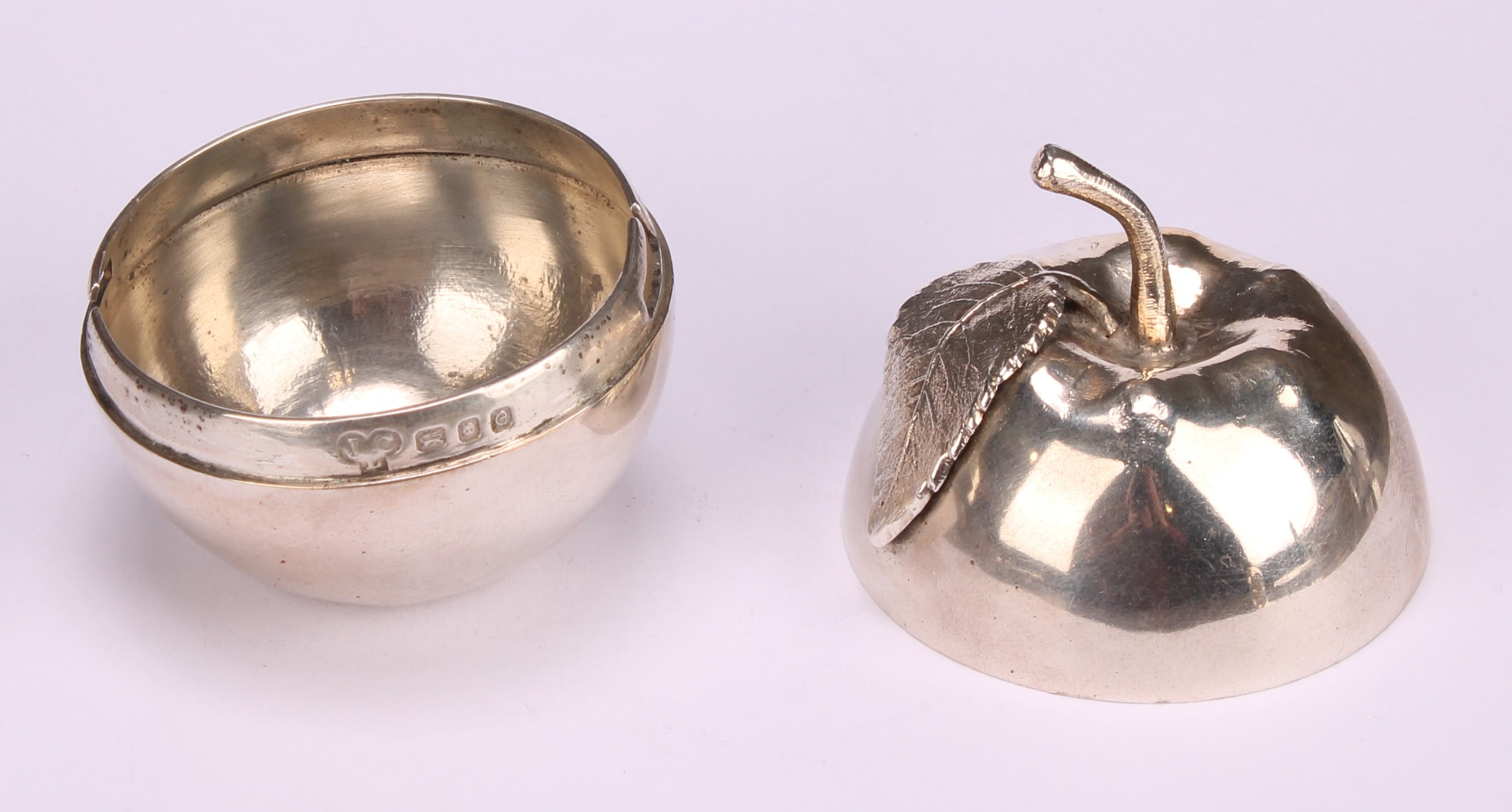 A pair of Elizabeth II silver novelty condiments and stands, modelled as apples, the cast leaf - Image 6 of 16