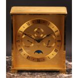 A mid 20th century Swiss brass desk clock, 14cm brass dial inscribed LOOPING 15 JEWELS ⑧, Roman