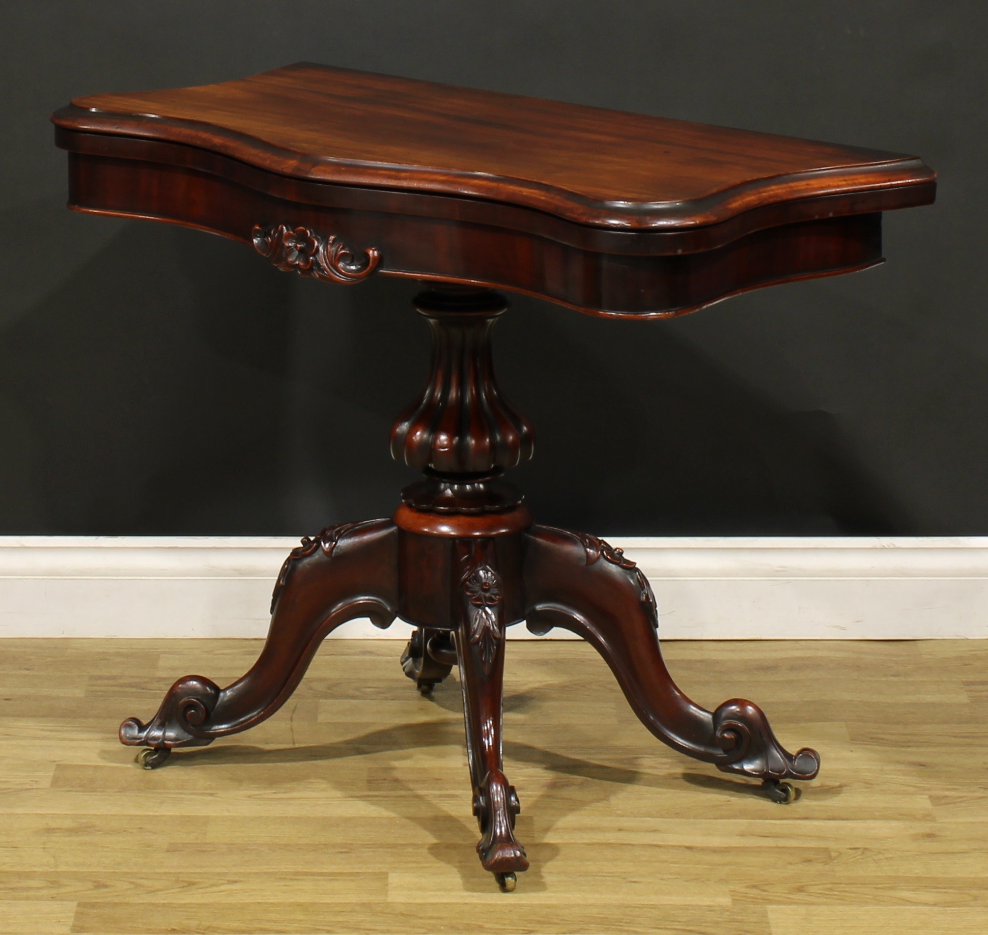 A Victorian mahogany serpentine card table, hinged top with moulded edge enclosing a baize lined - Image 5 of 6