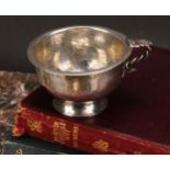 A Swedish silver wine cup, vine handle, flared rim, skirted base, 6.5cm diam, 18th century