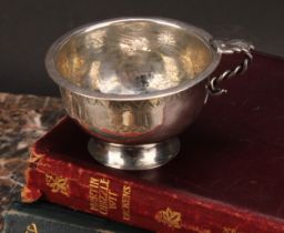 A Swedish silver wine cup, vine handle, flared rim, skirted base, 6.5cm diam, 18th century