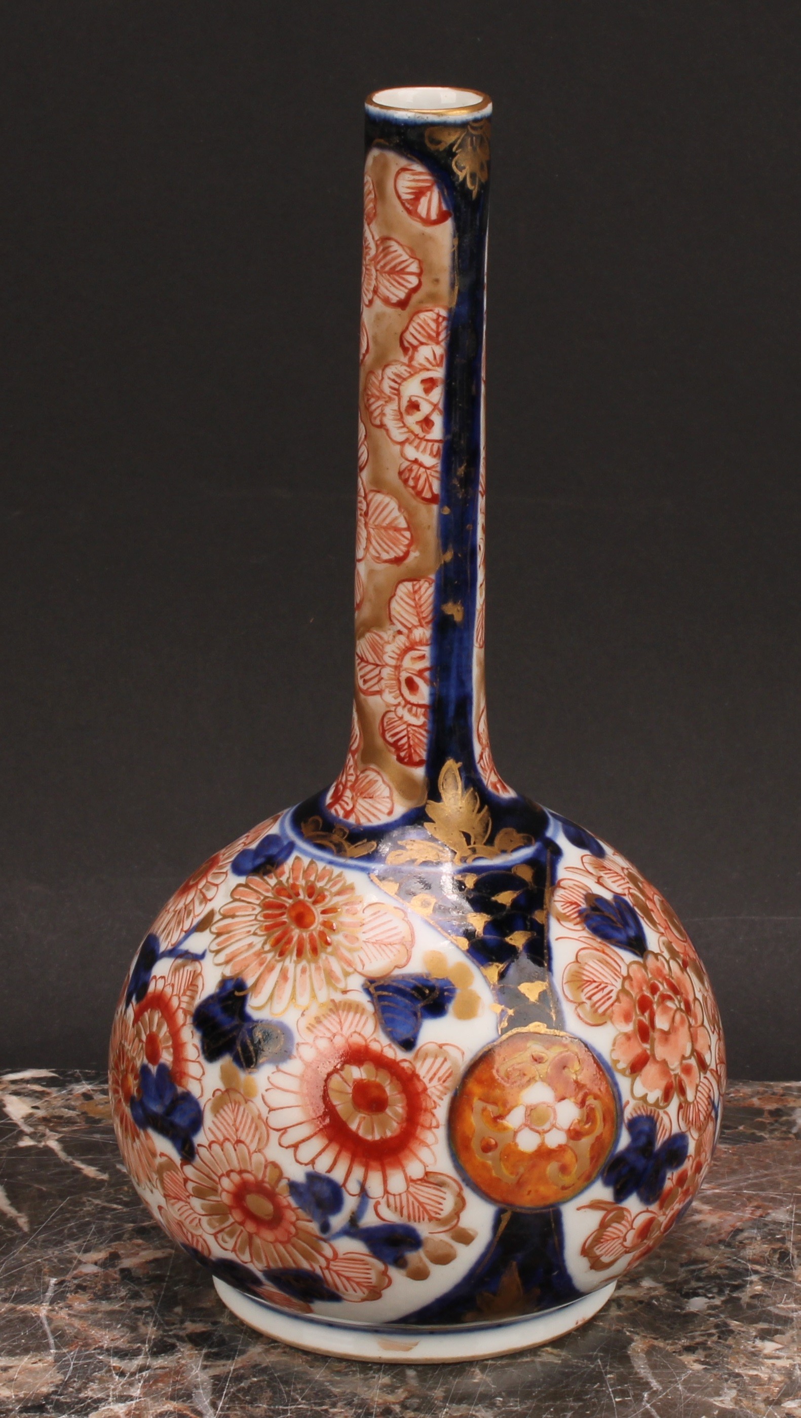 A pair of Japanese porcelain bottle vases, decorated in the Imari palette with peonies and - Image 3 of 8