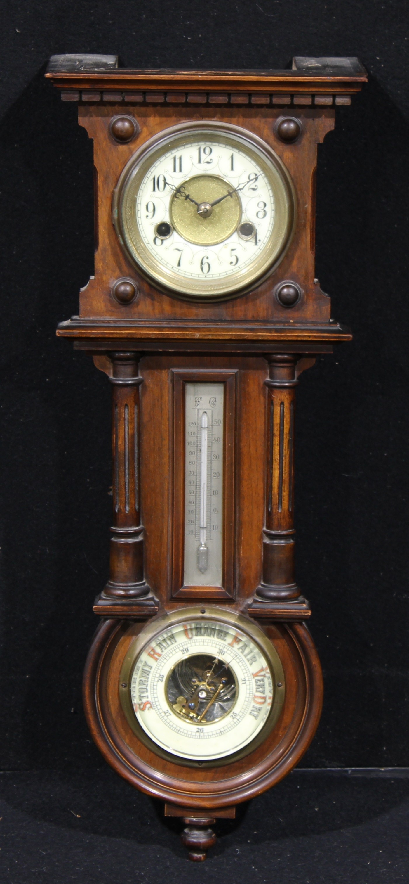 A late 19th century walnut wall hanging weather station, 10cm clock dial inscribed with Arabic