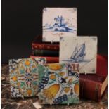 A harlequin suite of four 18th century Delft tiles, polychrome and traditional (4)