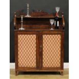 An unusual George IV simulated rosewood chiffonier, shaped superstructure with shallow shelf,