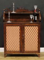 An unusual George IV simulated rosewood chiffonier, shaped superstructure with shallow shelf,