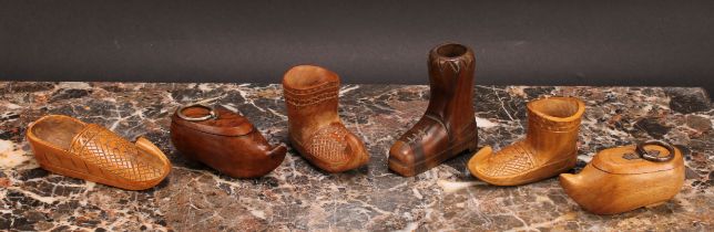An early 20th century treen snuff box, carved as a shoe, 9cm wide; another similar; a Continental