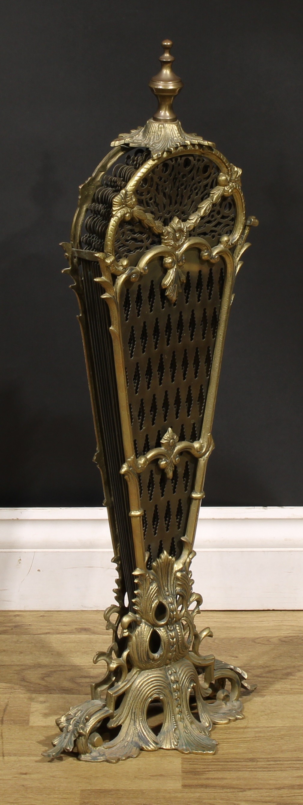 A Louis XV style gilt metal fan fire guard, pierced and cast with leafy scrolls, 75cm high, 109cm - Image 3 of 3