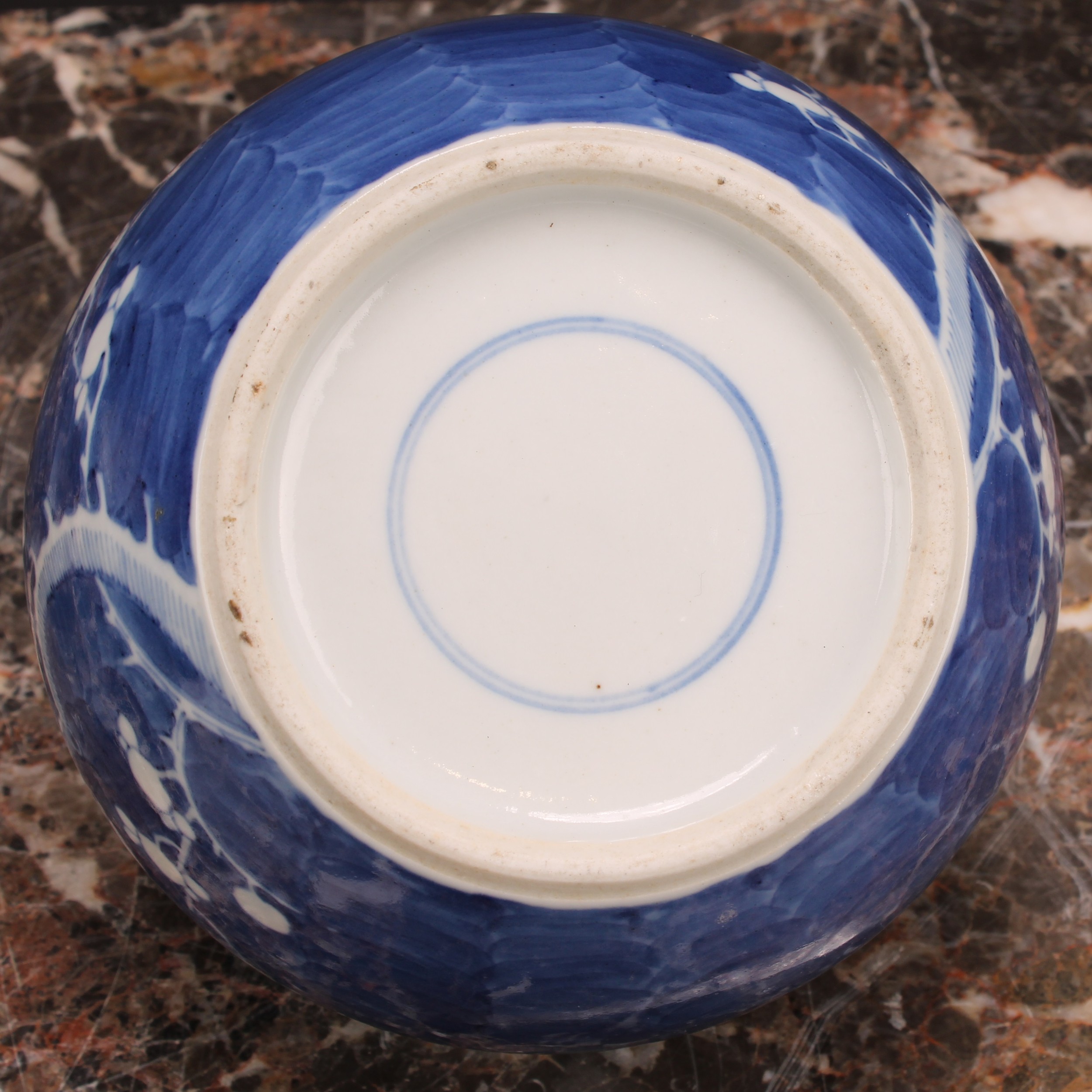 A Chinese ovoid ginger jar, painted in tones of underglaze blue with blossoming prunus on a ground - Image 5 of 9