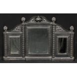 A Victorian cast iron chimney glass, broken-arch pediment above three bevelled mirror plates, 67cm