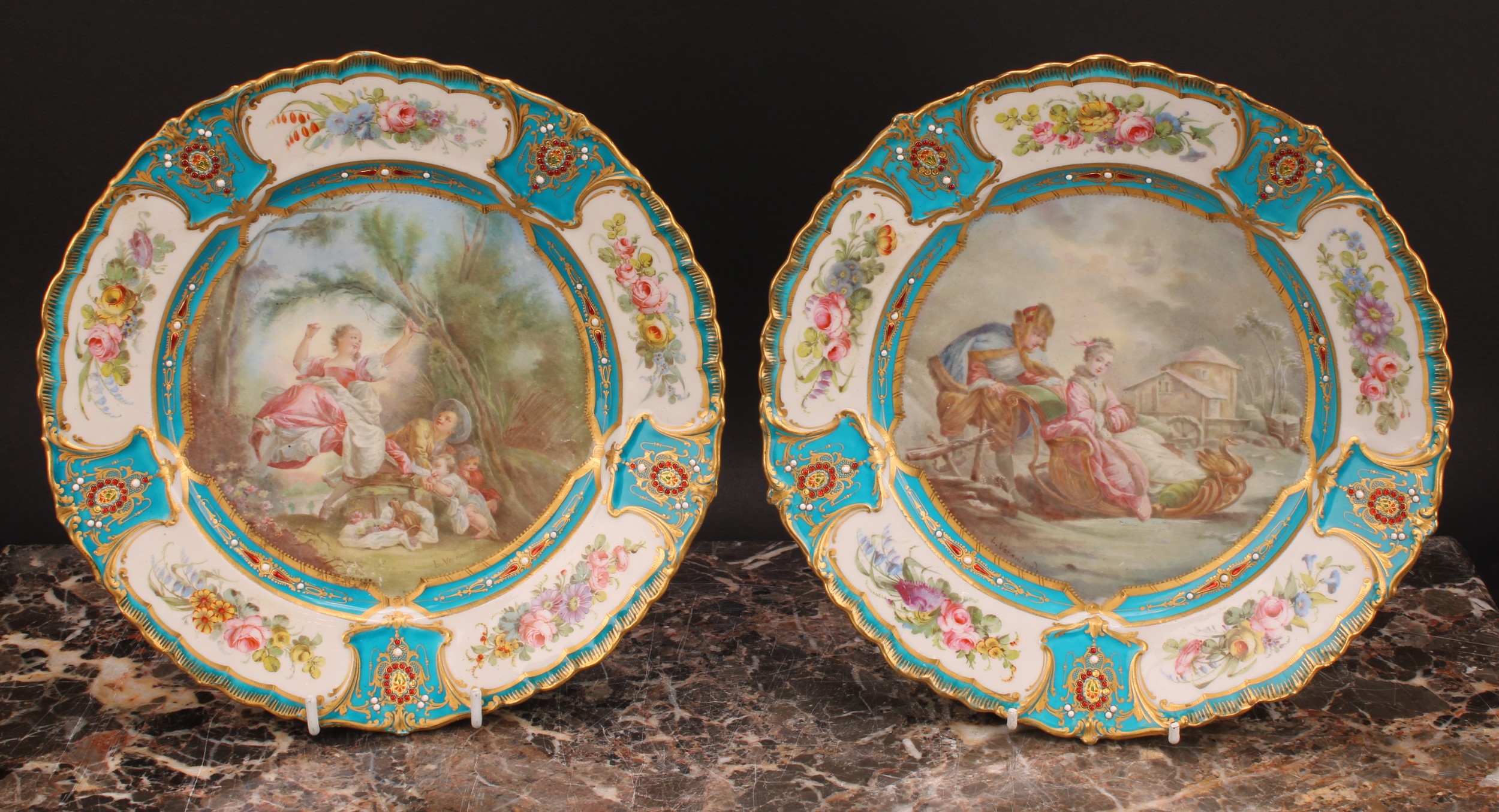 A pair of Sevres shaped circular plates, painted by L Vergniaud, signed, with a courting couple in a - Image 2 of 5