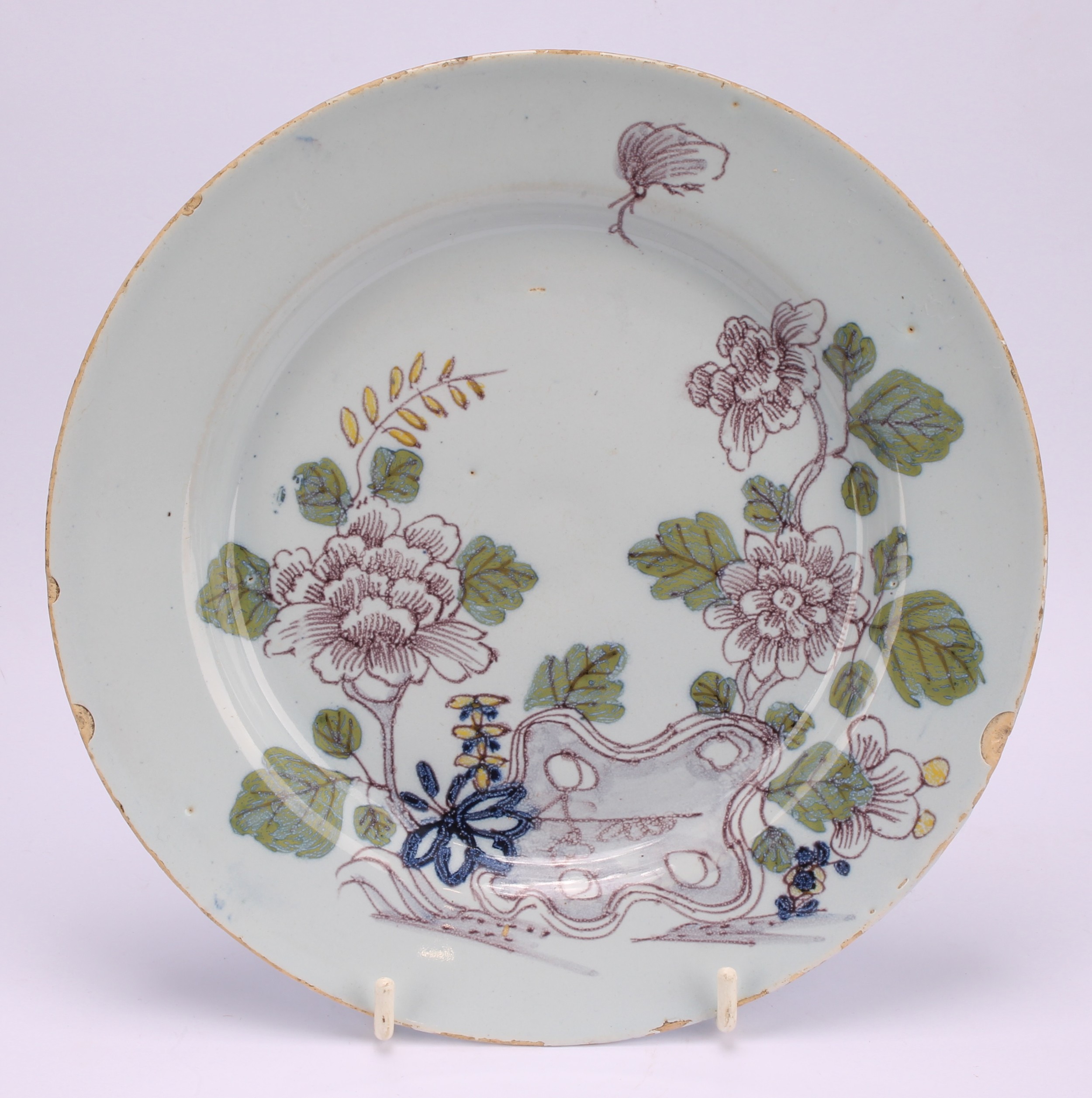 An 18th century Delft circular plate, painted in the chinoiserie taste with a figure in a Chinese - Image 11 of 18