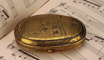 An early 18th century Dutch brass oval tobacco box, engraved with narrative scenes, hinged cover