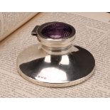 A George V silver and guilloche enamel capstan inkwell, hinged cover decorated in tones of purple,