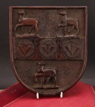 Heraldry - a 19th century oak armorial panel, carved in relief with the arms of Parke of Sutton