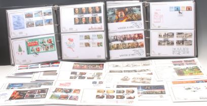 Stamps - QEII FDC collection in two binders and loose, all appear to be 'Cotswold' covers, including