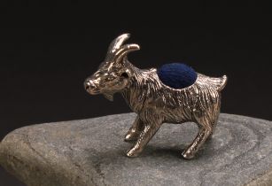 A sterling silver novelty pin cushion, as a goat, 3.5cm long