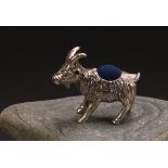 A sterling silver novelty pin cushion, as a goat, 3.5cm long