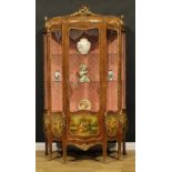 A large Louis XV Revival gilt metal mounted walnut and vernis Martin serpentine vitrine, three