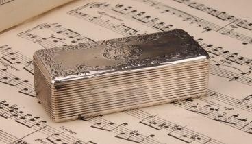 A 19th century French silver rounded rectangular snuff box, hinged cover chased with a cartouche and