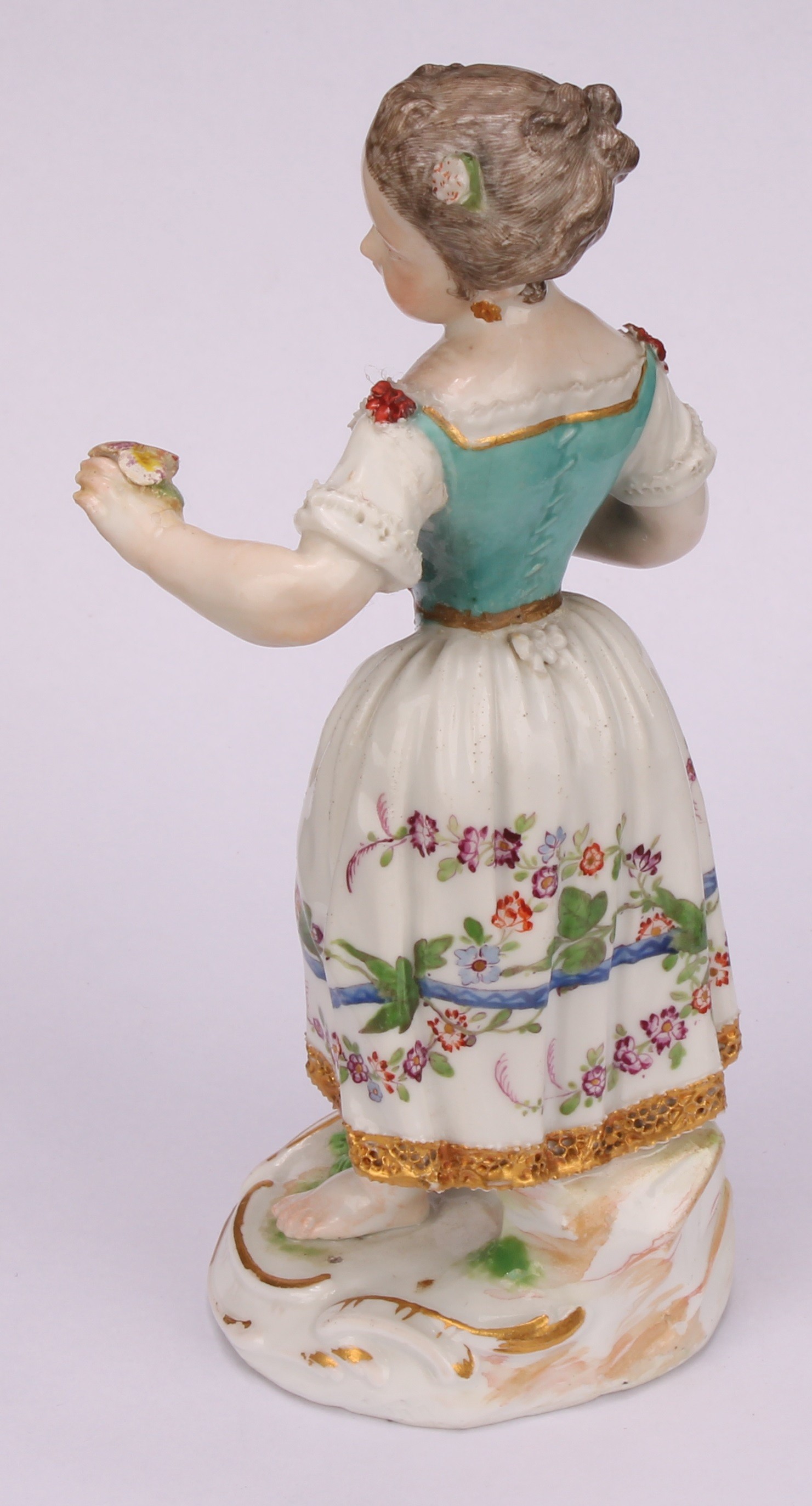 A Meissen porcelain figure, of a girl wearing a floral dress, with posies in hand, scroll base, - Image 4 of 5