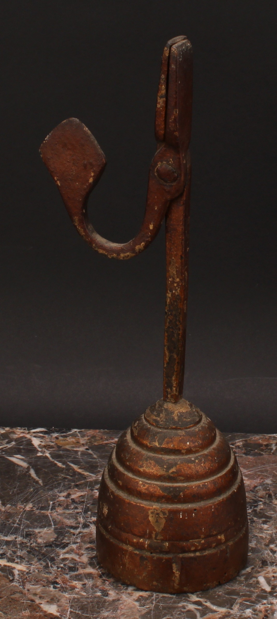 A wrought iron nip rushlight holder, stepped circular wood base, 27cm high, 18th/19th century - Image 2 of 3