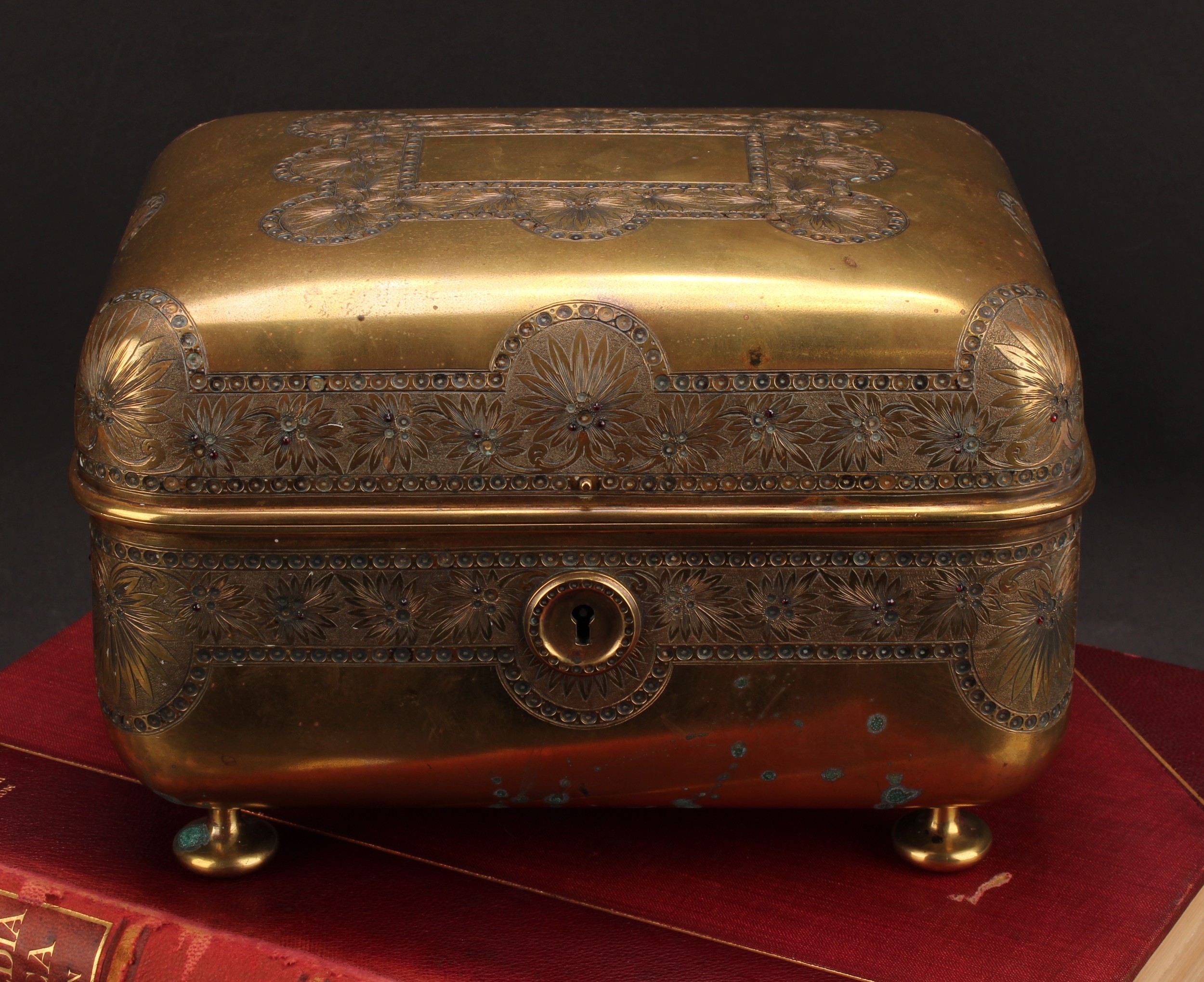 A Russian Imperial design brass table box, hinged cover, engraved throughout with stiff leaves,