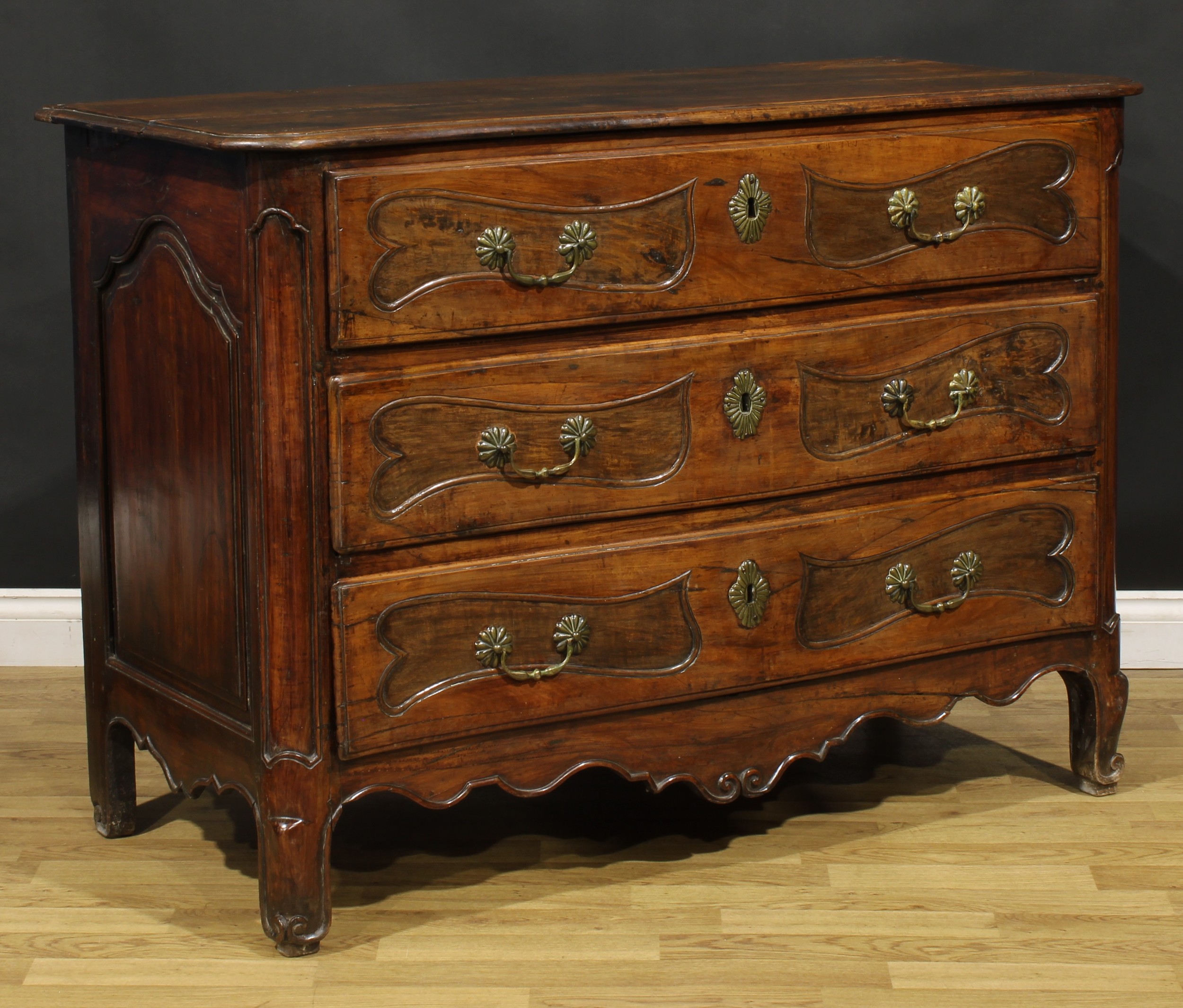 An 18th century French Provincial chestnut serpentine commode, slightly oversailing top with moulded - Image 2 of 5