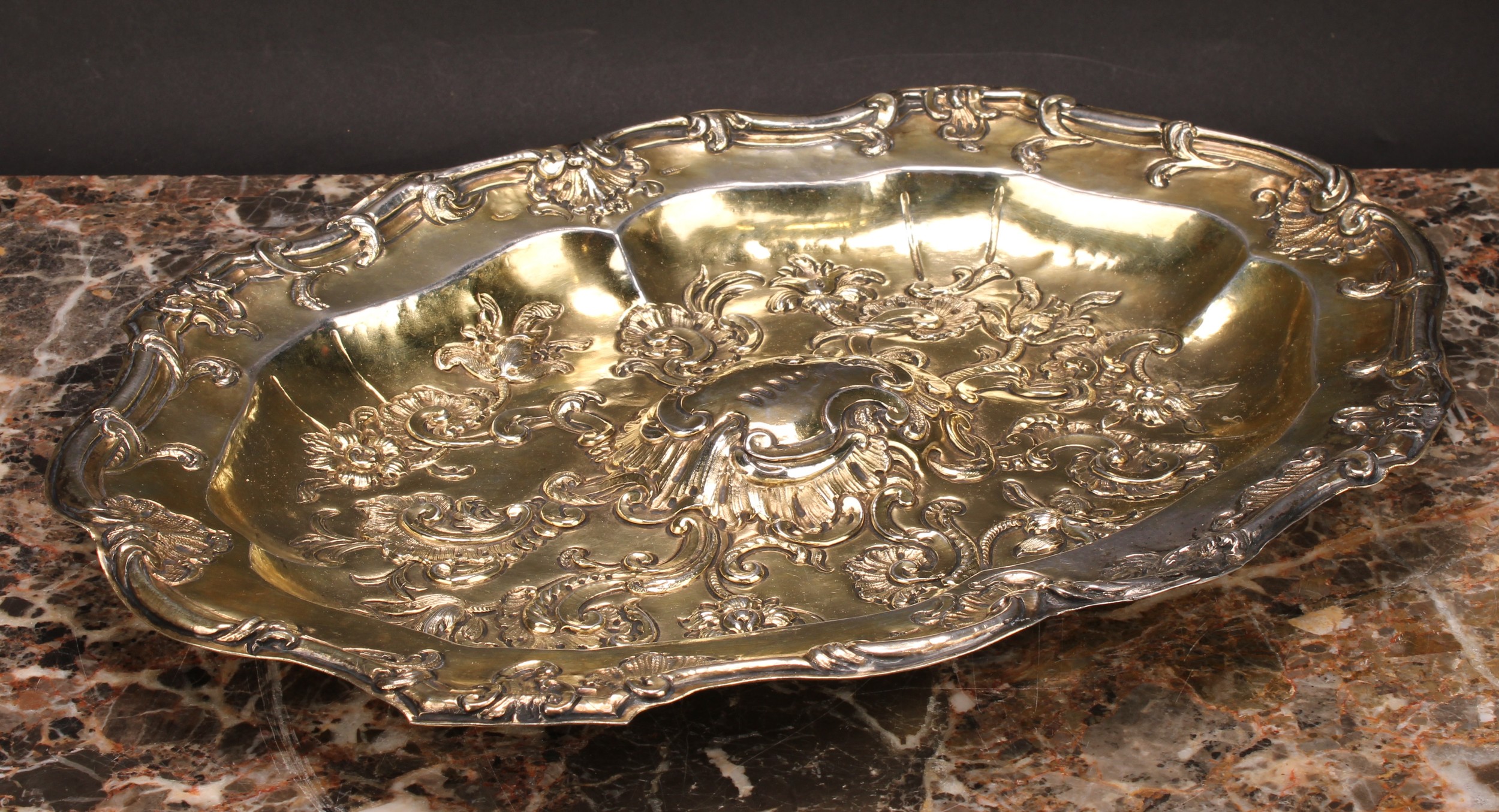 An 18th century Spanish silver-gilt shaped oval sideboard dish, chased with flowers and leafy - Image 3 of 5