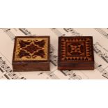 A Tunbridge ware puzzle box, containing seven-piece Chinese Puzzle and instructions, 5cm square,