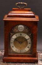 A George II style walnut bracket timepiece, by Elliott, 11cm arched brass clock dial with silvered