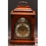 A George II style walnut bracket timepiece, by Elliott, 11cm arched brass clock dial with silvered