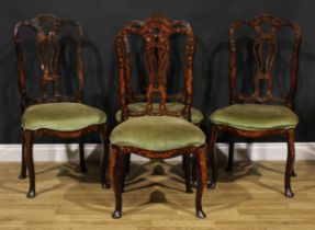 A set of four 19th century Dutch marquetry dining chairs, each with stuffed-over seat, cabriole