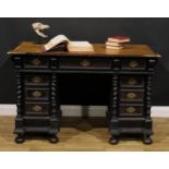 A 19th century Portuguese Baroque Revival twin pedestal desk, rectangular top with inset writing