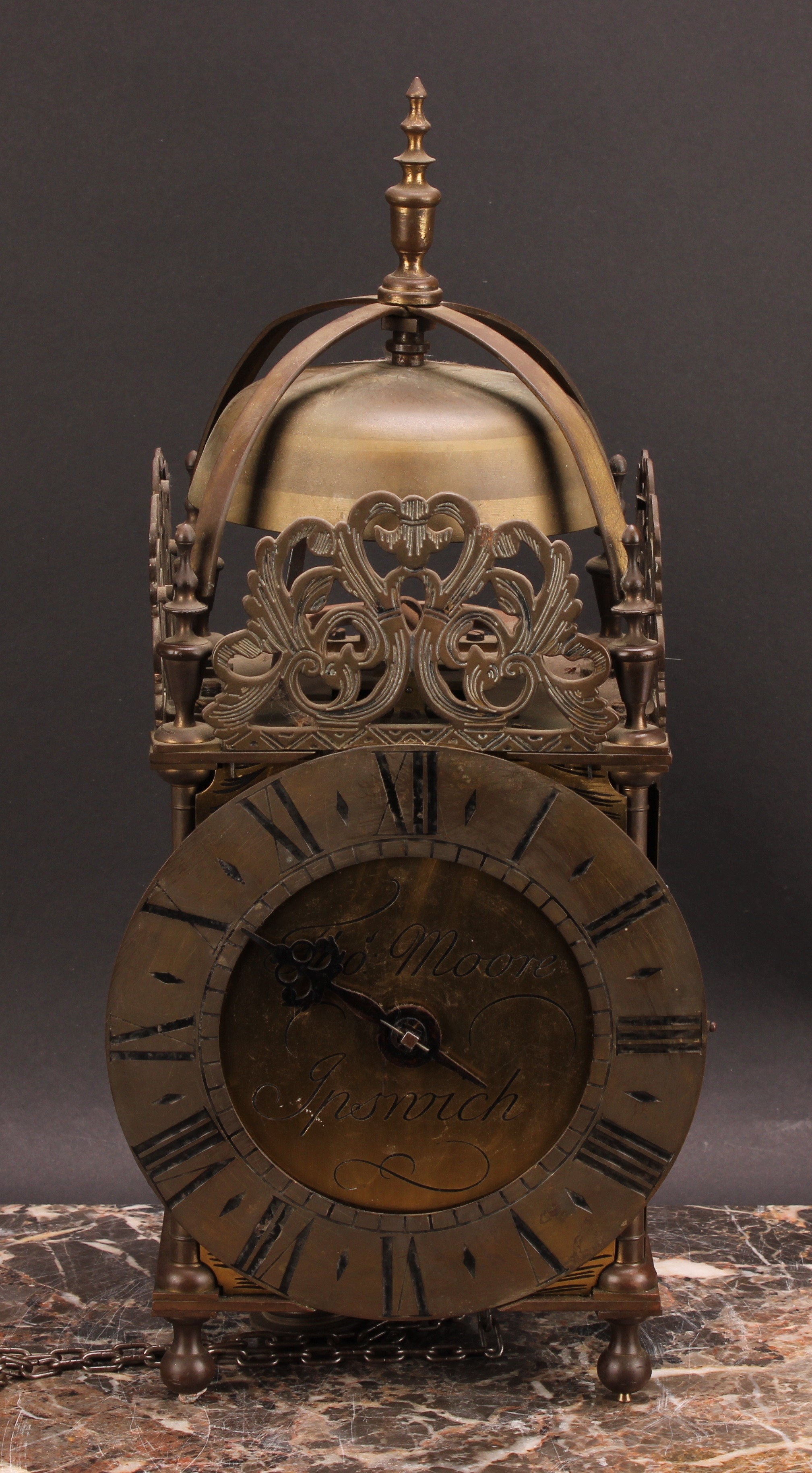 An early 18th century style brass lantern clock, 17cm dial inscribed Thomas Moore, Ipswich, Roman