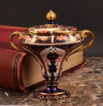 A Royal Crown Derby 1128 Imari pattern flattened campana shaped two-handled vase and cover, oval