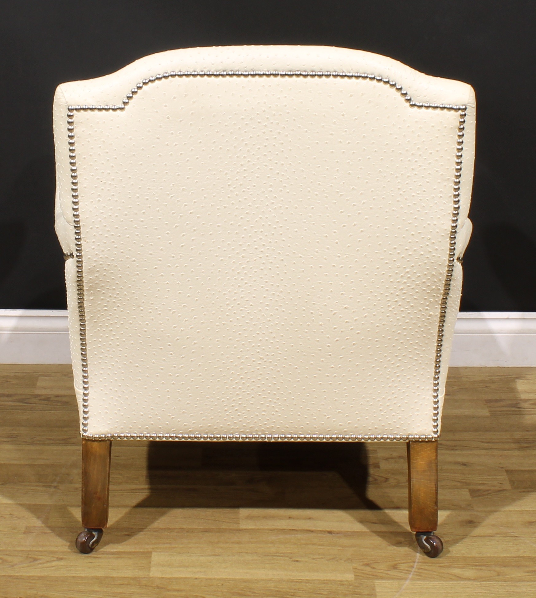 A Victorian walnut easy chair, in the manner of Howard & Sons, stuffed-over ostrich hide upholstery, - Image 4 of 4