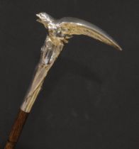 A French Art Nouveau silver novelty walking stick, the handle as an eagle perched on a rocky