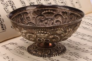 A 19th century Dutch silver pedestal bowl, chased with scrolling foliage and stylised crowns