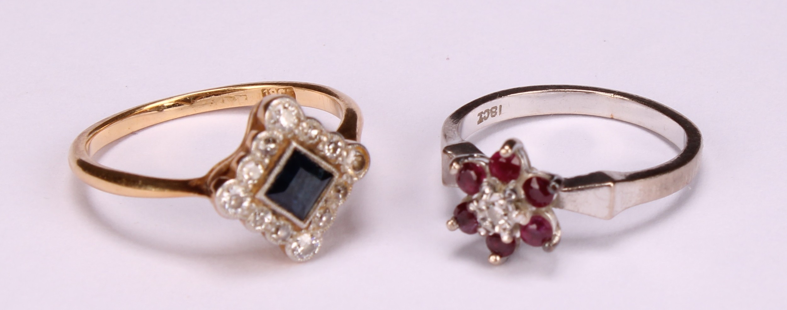 A diamond and sapphire square set cluster ring, the central cushion cut stone within a border of - Image 2 of 8