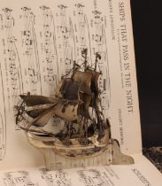 An early 20th century Dutch silver miniature nef, typically modelled as a sailing ship, with