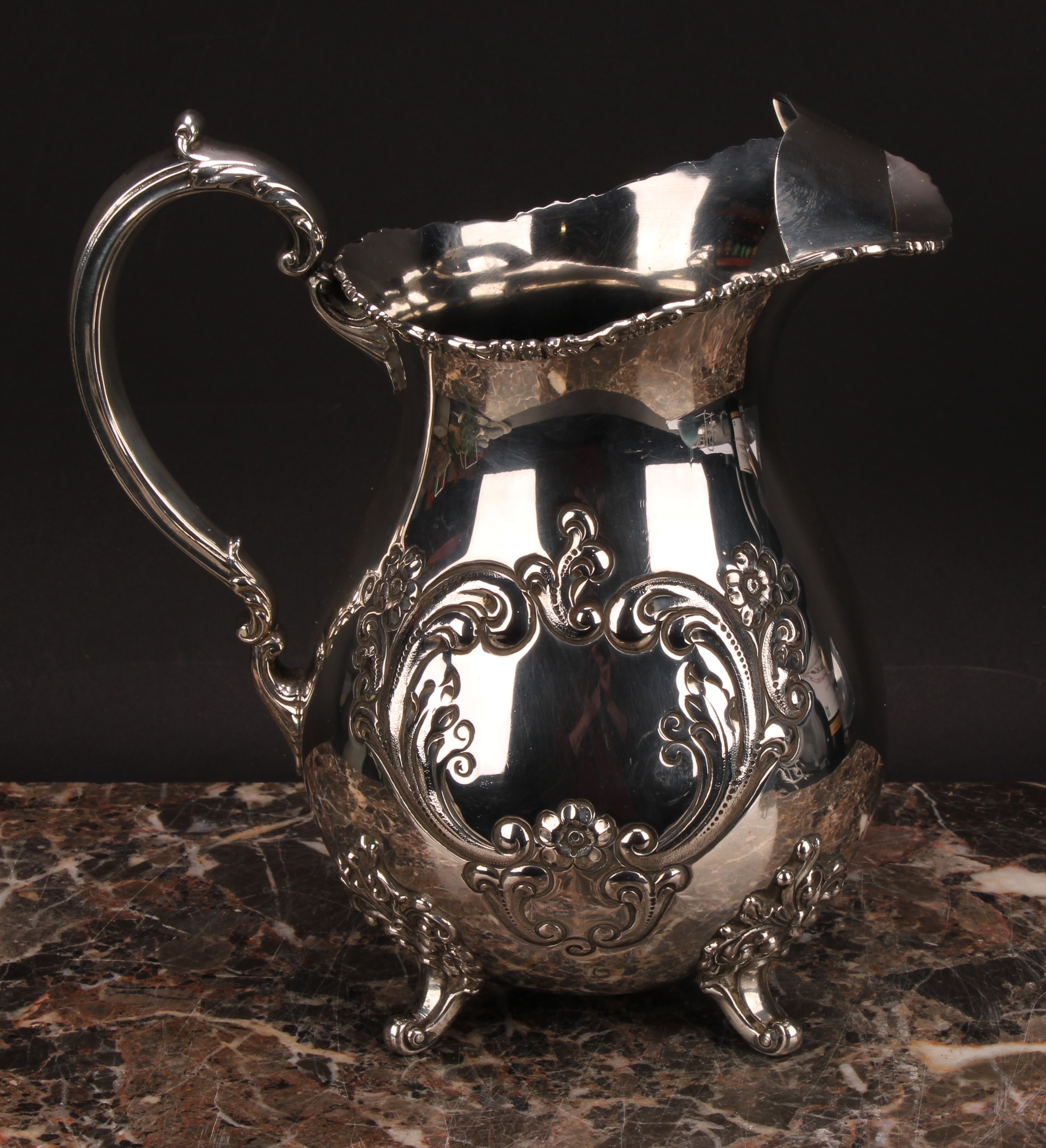 An American silver Pimm's jug, chased with flowers and scrolling leaves, 21cm high, Poole Silver Co, - Image 2 of 5